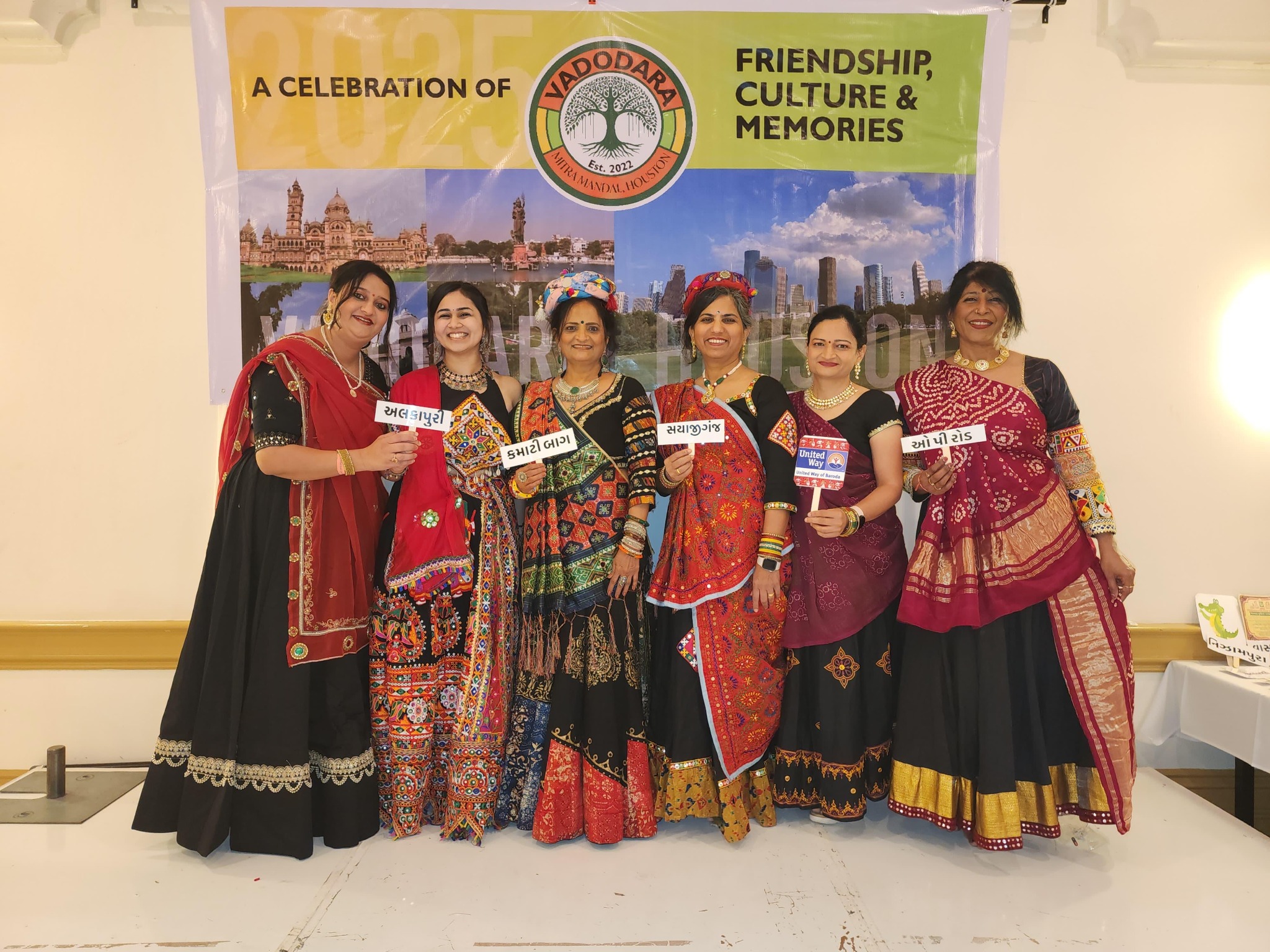Community group photo in traditional outfits